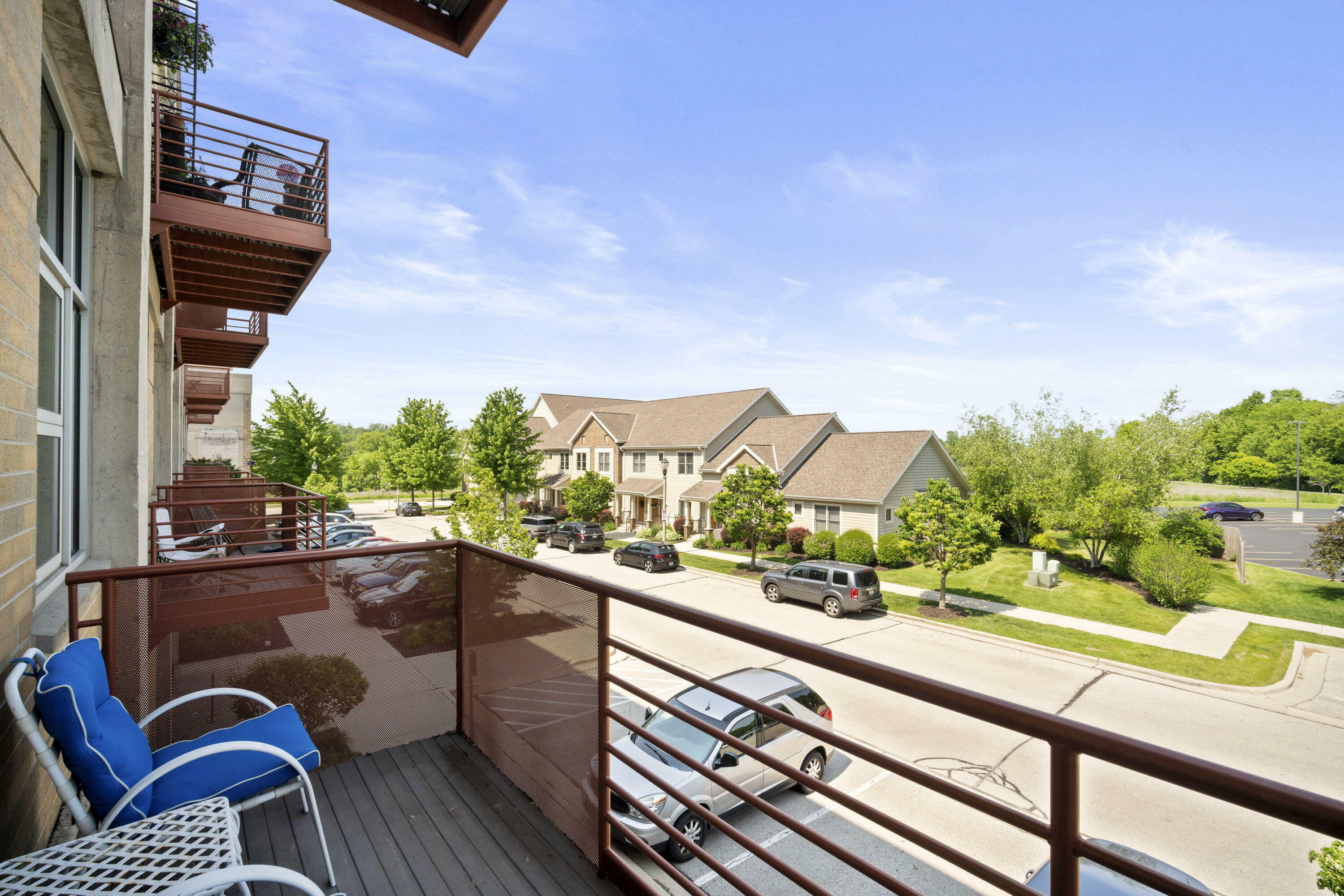 Property Photo:  705 Village Green Way 306  WI 53090 