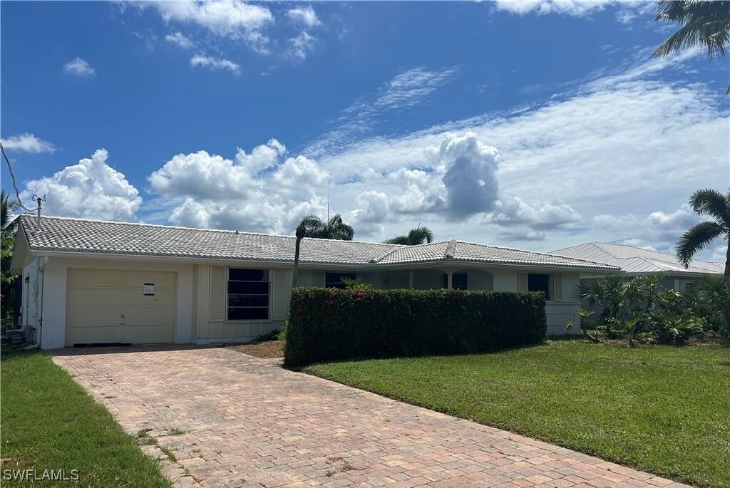 Property Photo: 3 Palmview Boulevard FL 33931