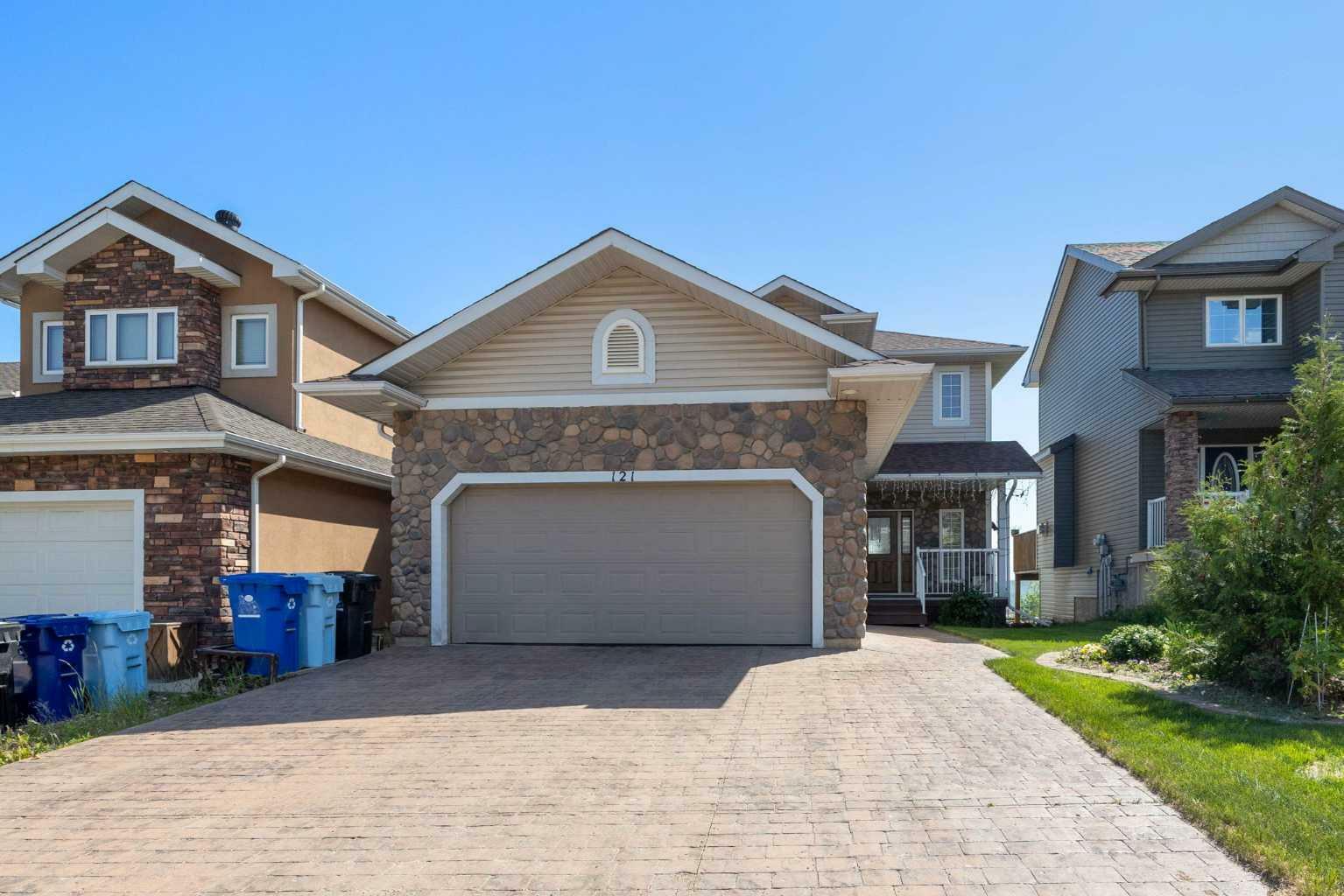 Property Photo: 121 Gravelstone Way AB T9K 0S8