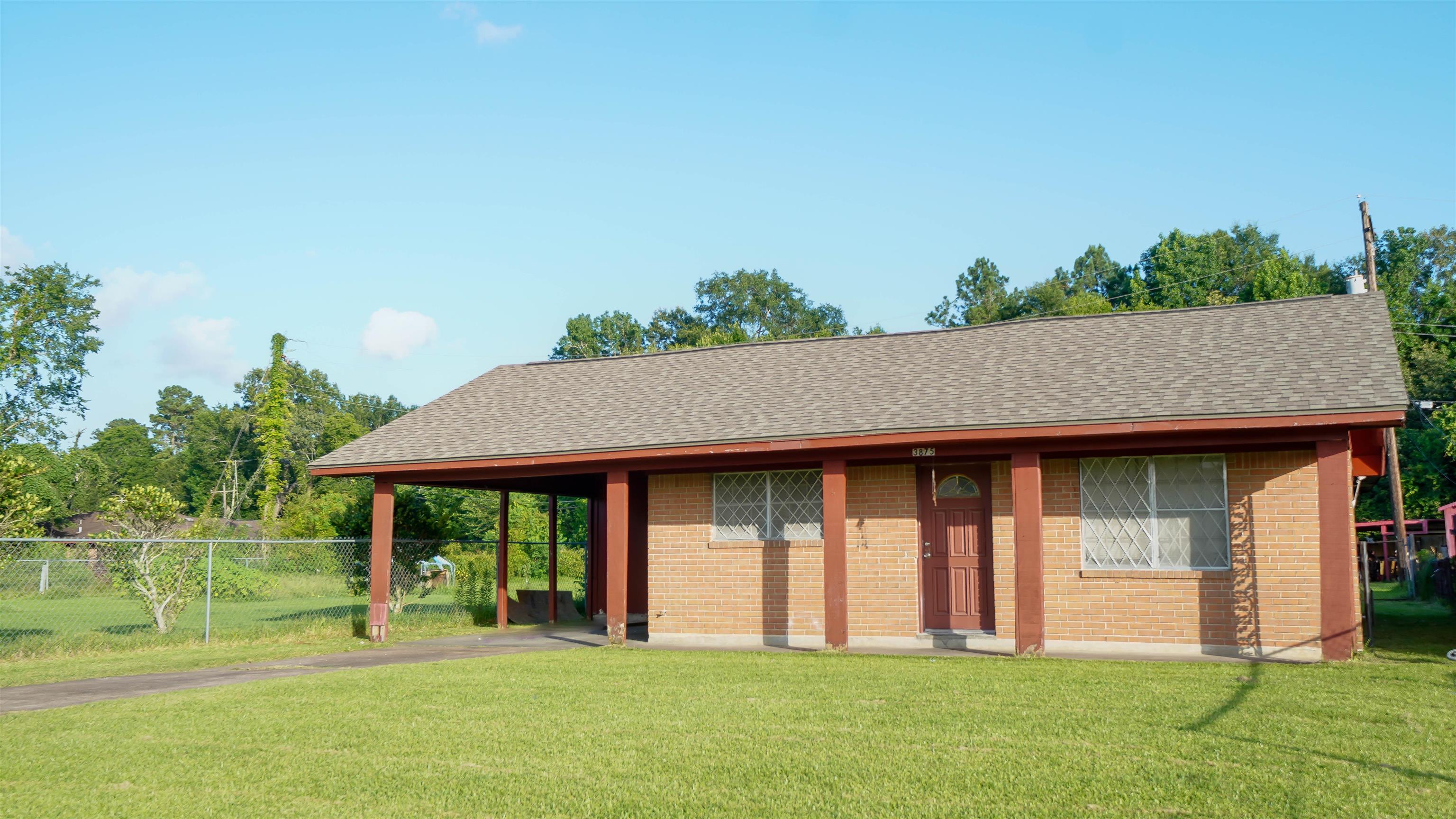 Property Photo: 3875 Bowen Drive TX 77708-4610