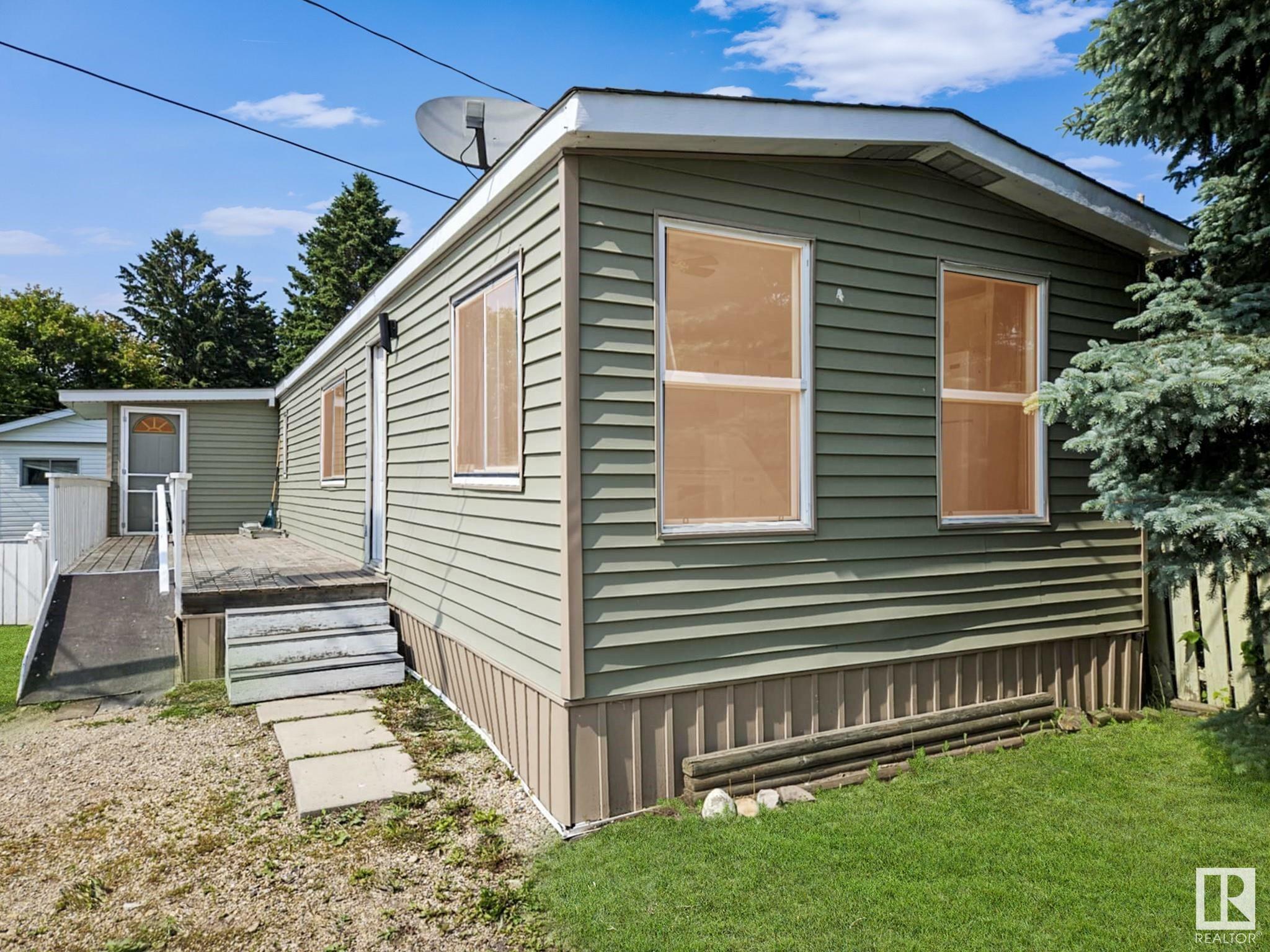 Property Photo: #111 305 Calahoo Rd AB T7X 3K7