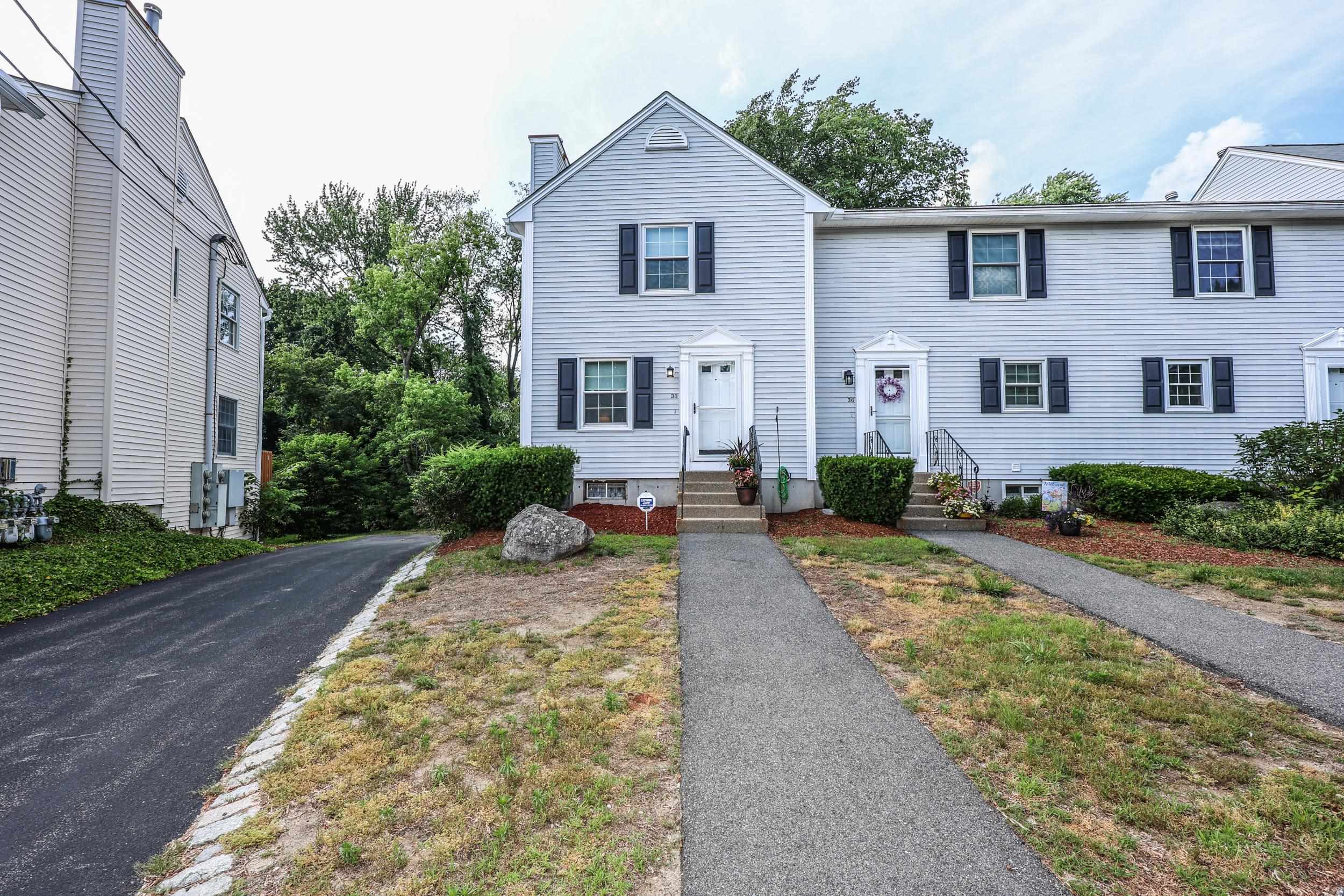 Property Photo: 38 Brook Hollow Way NH 03103