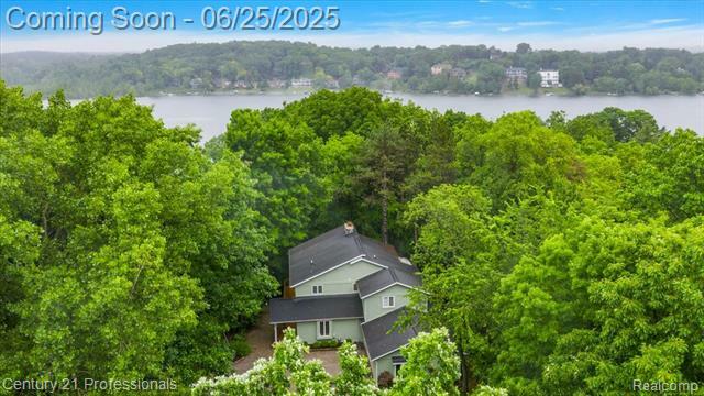 Property Photo:  7340 Deer Lake Road  MI 48346 