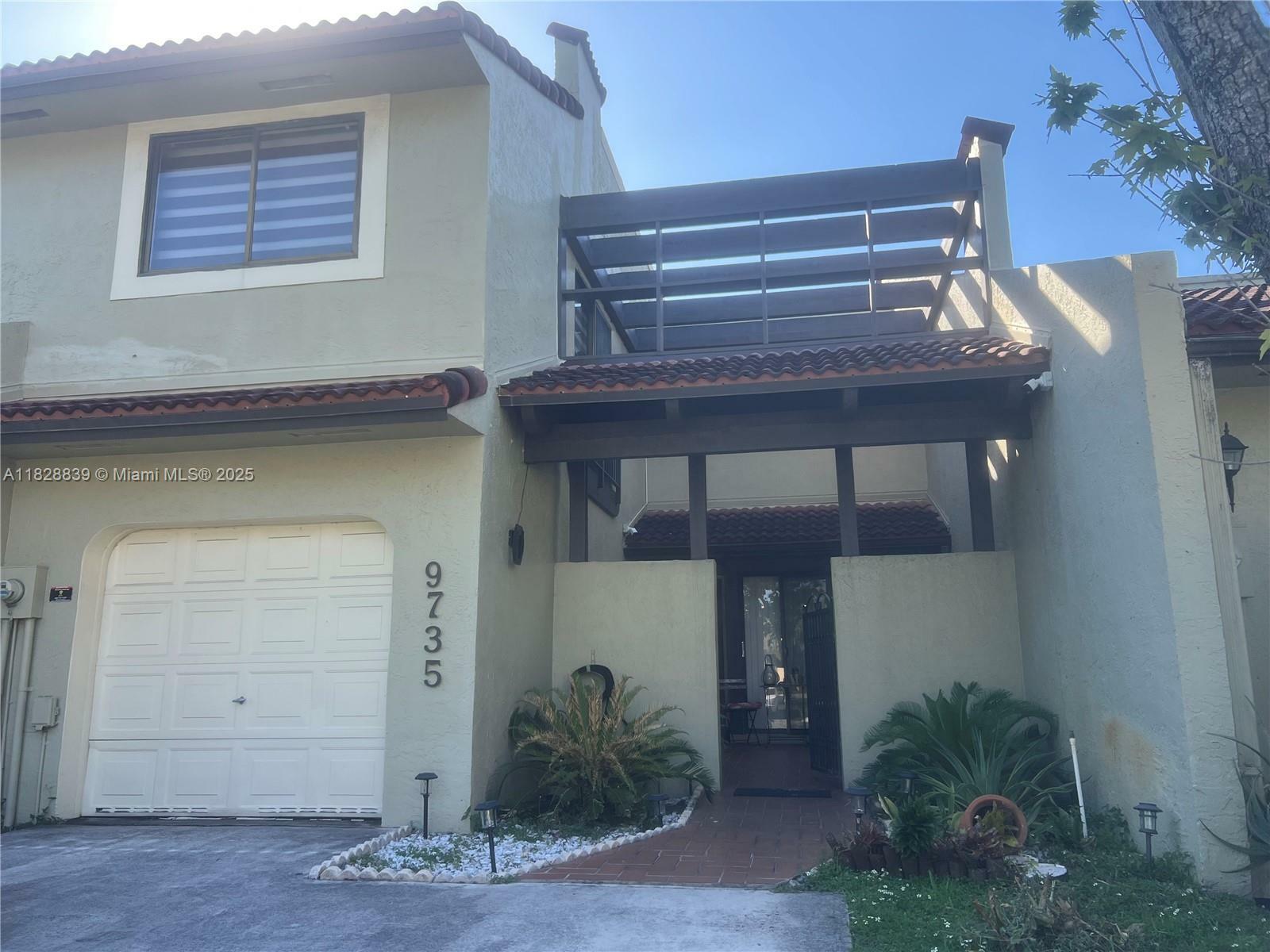 Property Photo: 9735 Costa Del Sol Blvd F-101 FL 33178