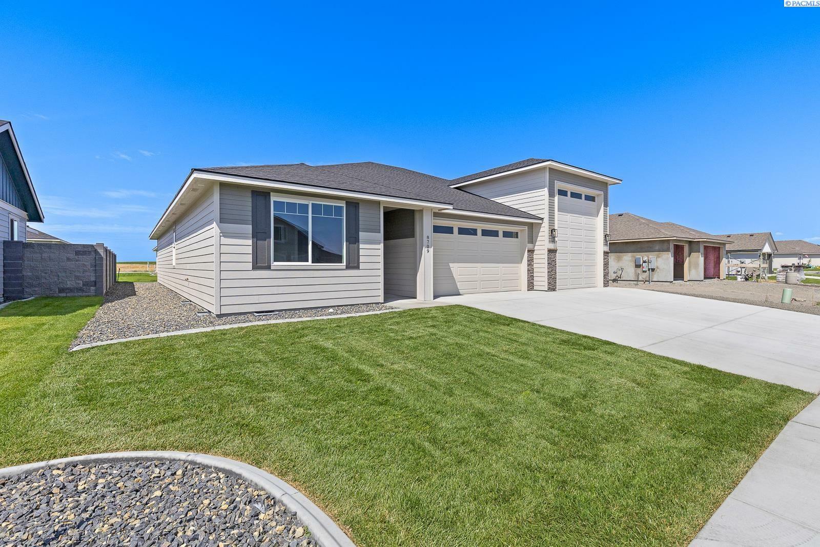 Property Photo: 8709 Ashen Dr. WA 99301