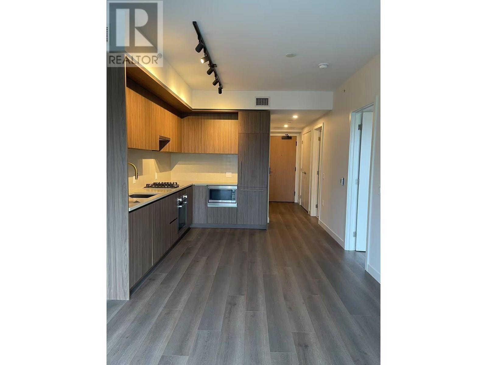 Property Photo:  5987 Wilson Avenue 1305  BC V5H 0L7 