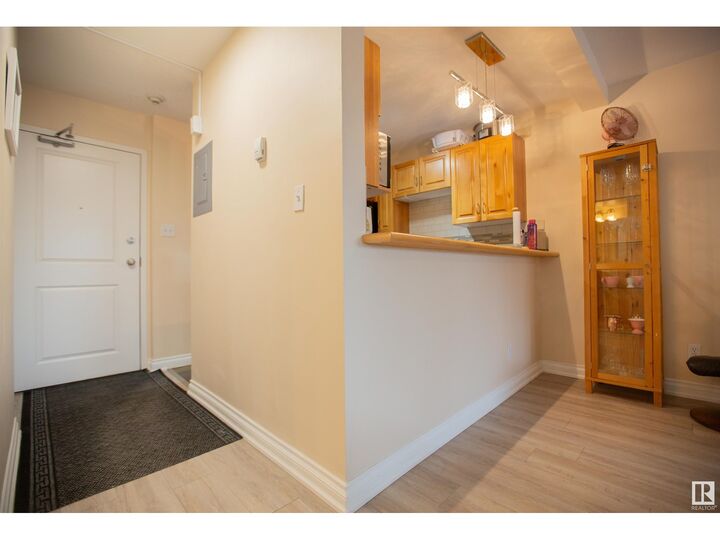 Property Photo:  #213 11033 127 St NW  AB T5M 0T3 