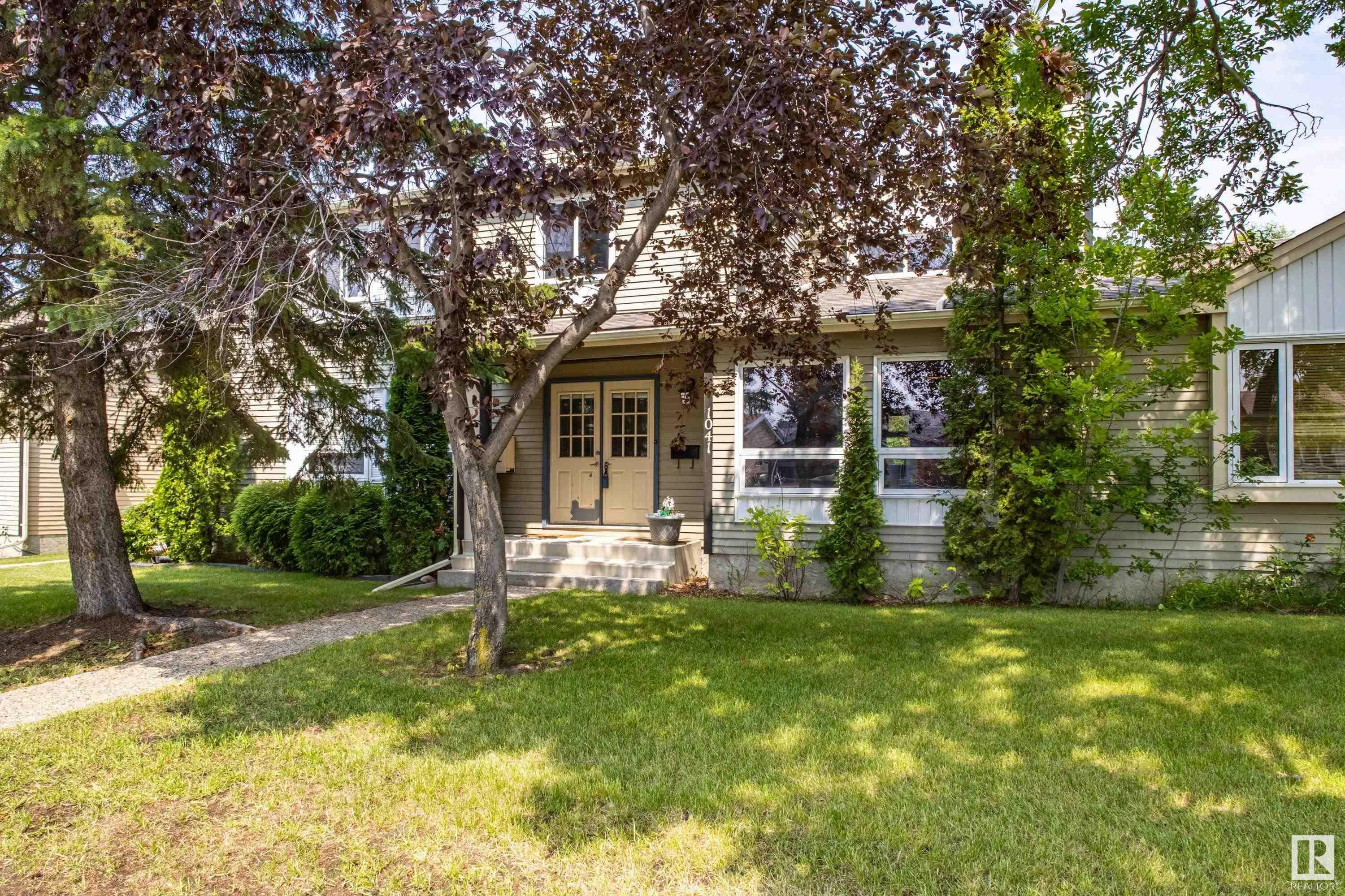 Property Photo: 1041 Village Drive AB T8A 4L4