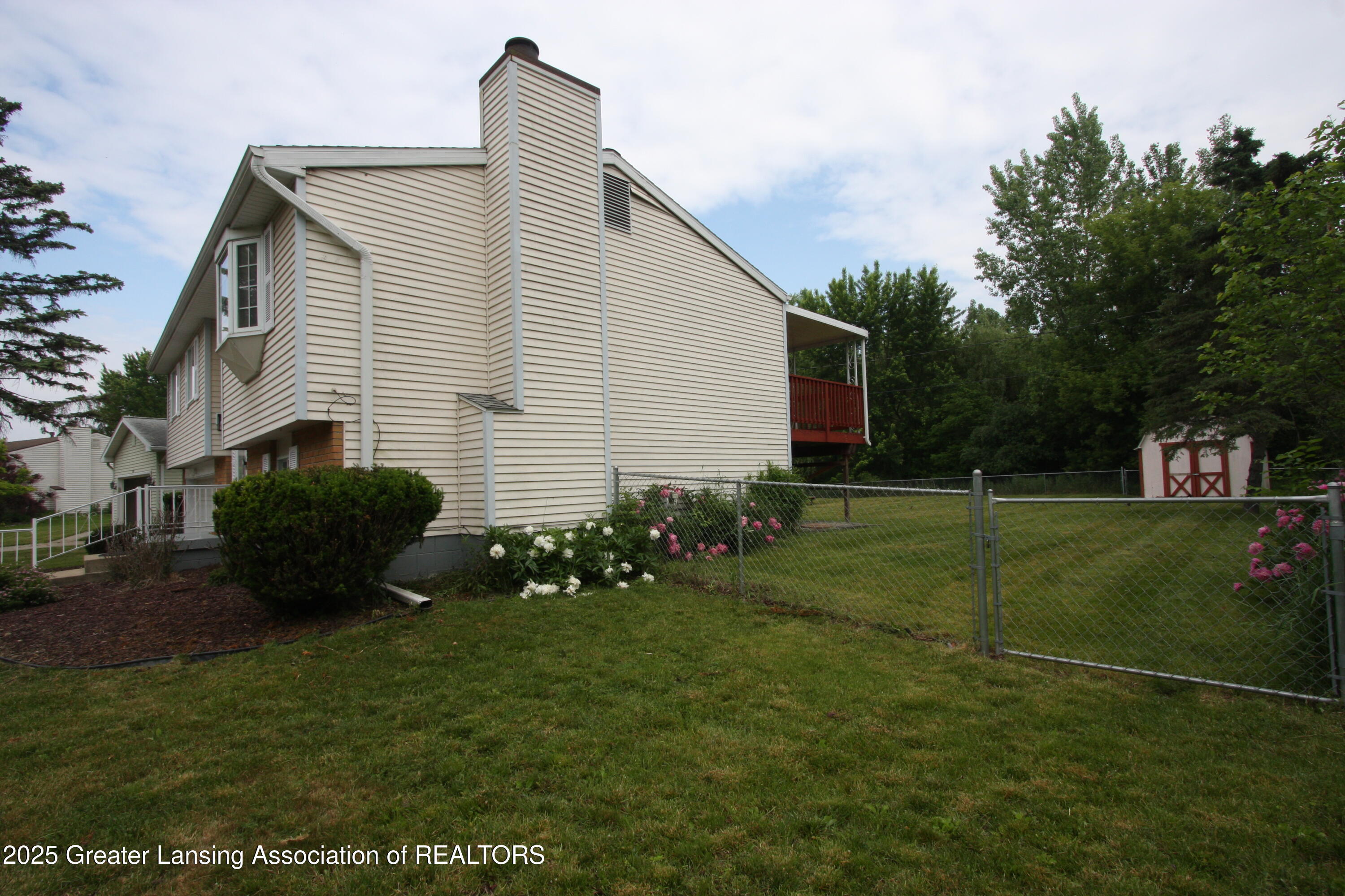 Property Photo: 3231 Stonewood Drive MI 48912