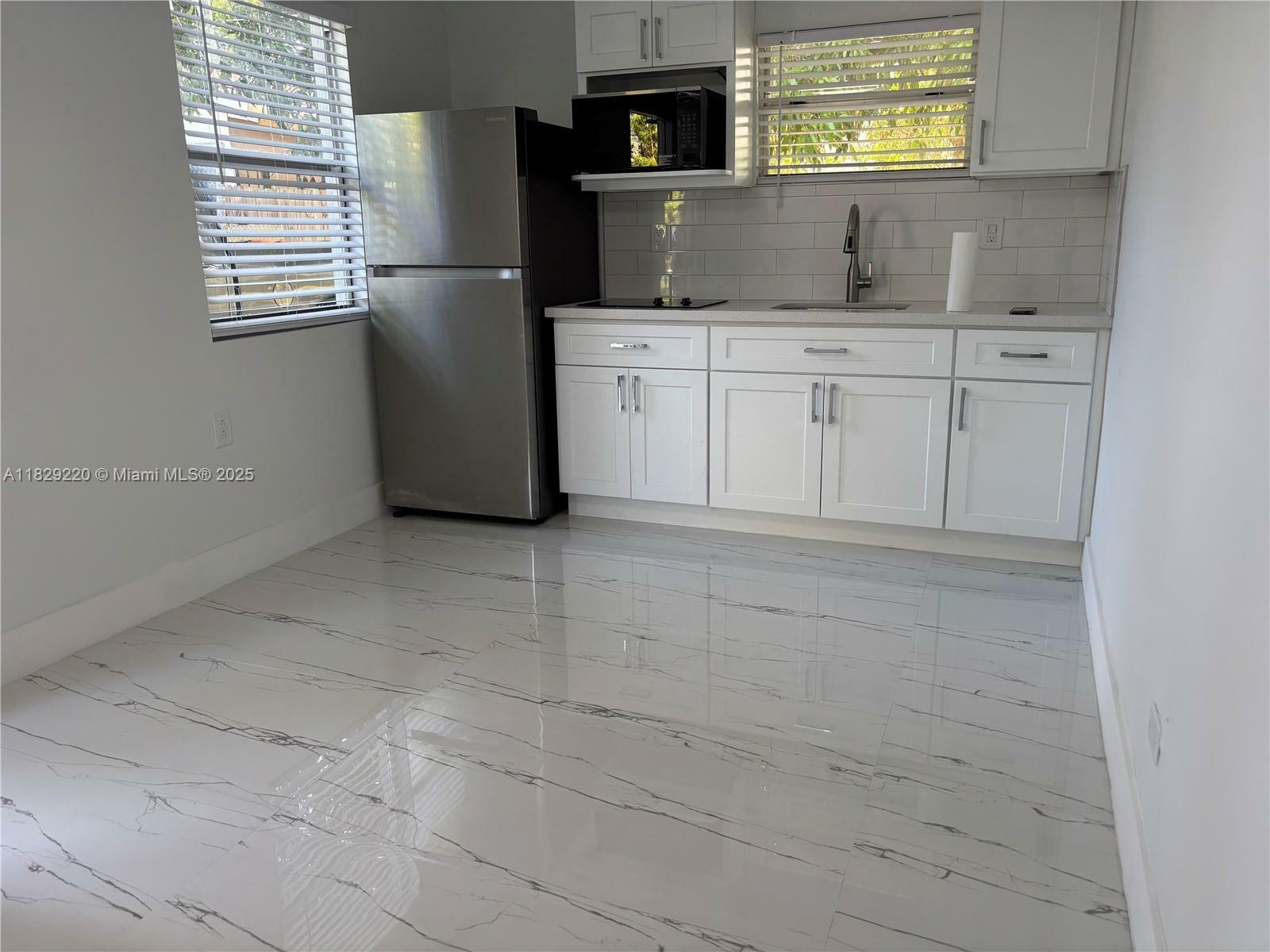 Property Photo:  214 NW 46th Ave 214  FL 33126 