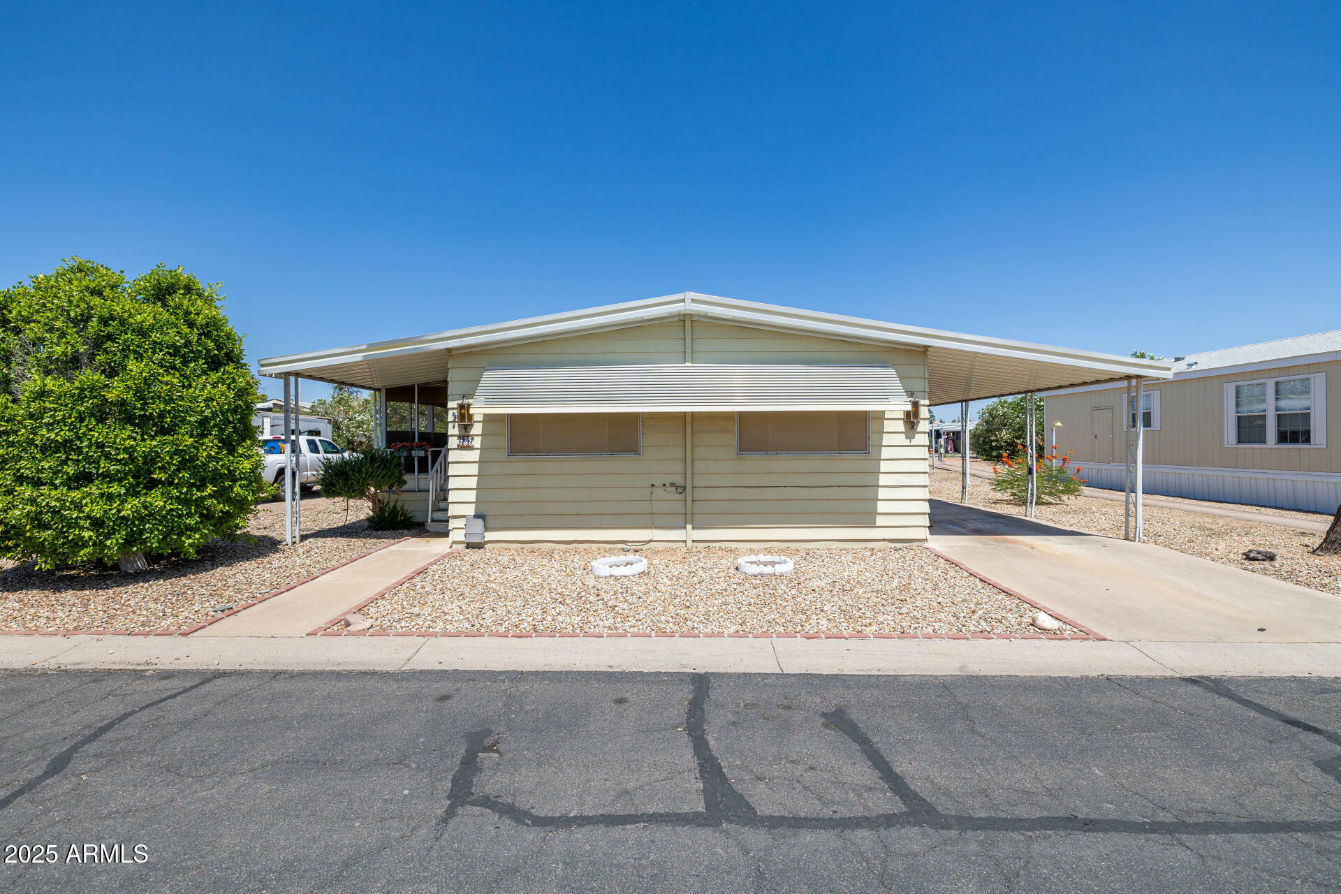Property Photo: 6960 W Peoria Avenue 74 AZ 85345