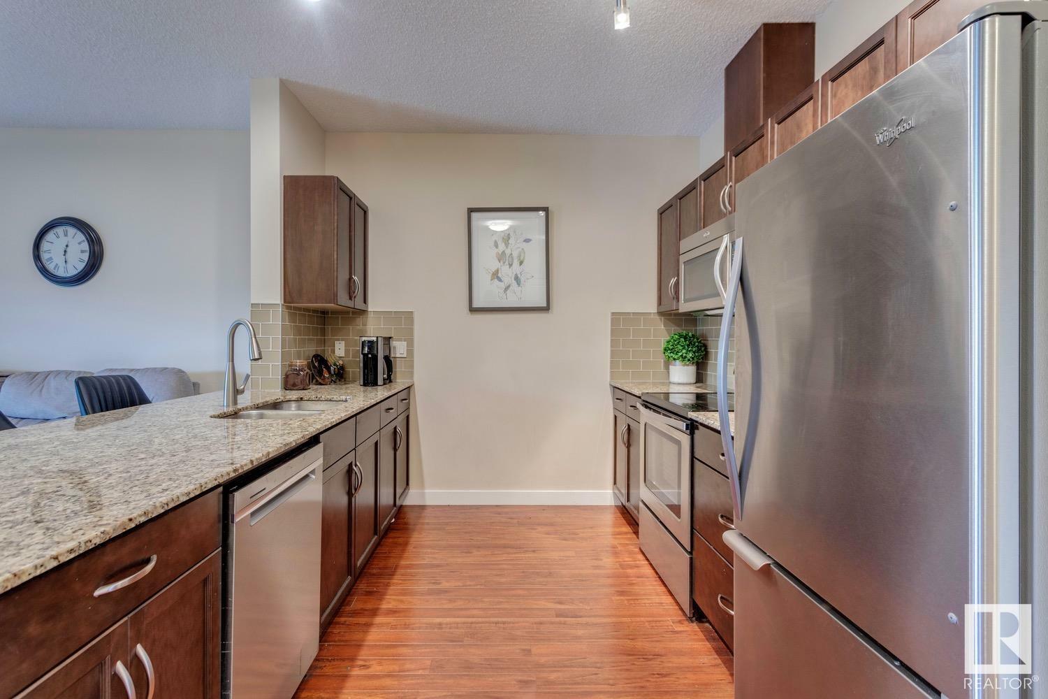 Property Photo: 2045 Grantham Court NW 426 AB T5T 3X6