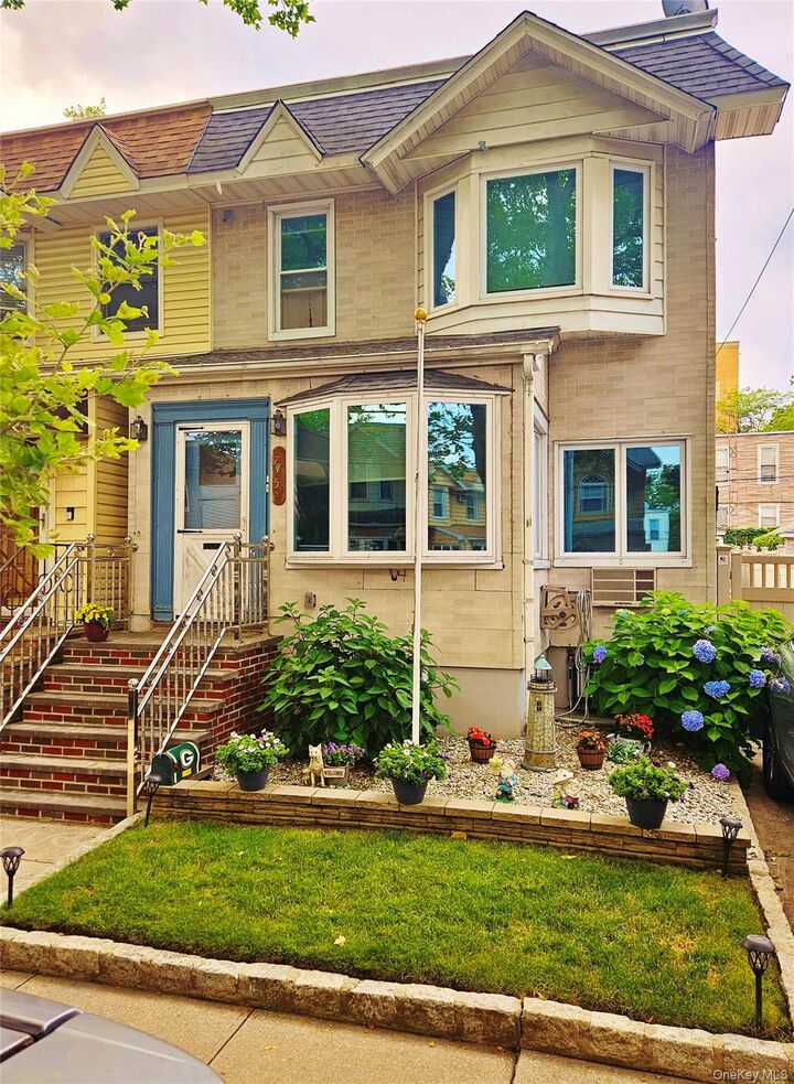 Property Photo:  77-52 76th Street  NY 11385 