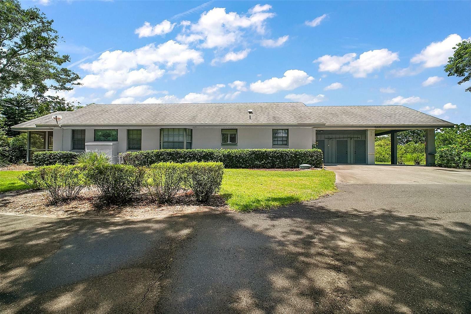 Property Photo: 16318, 16250 &Amp 16300 County Road 448 FL 32757