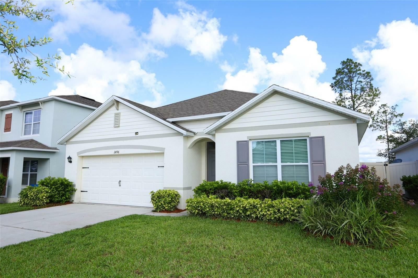 Property Photo: 2496 White Poppy Drive FL 34747