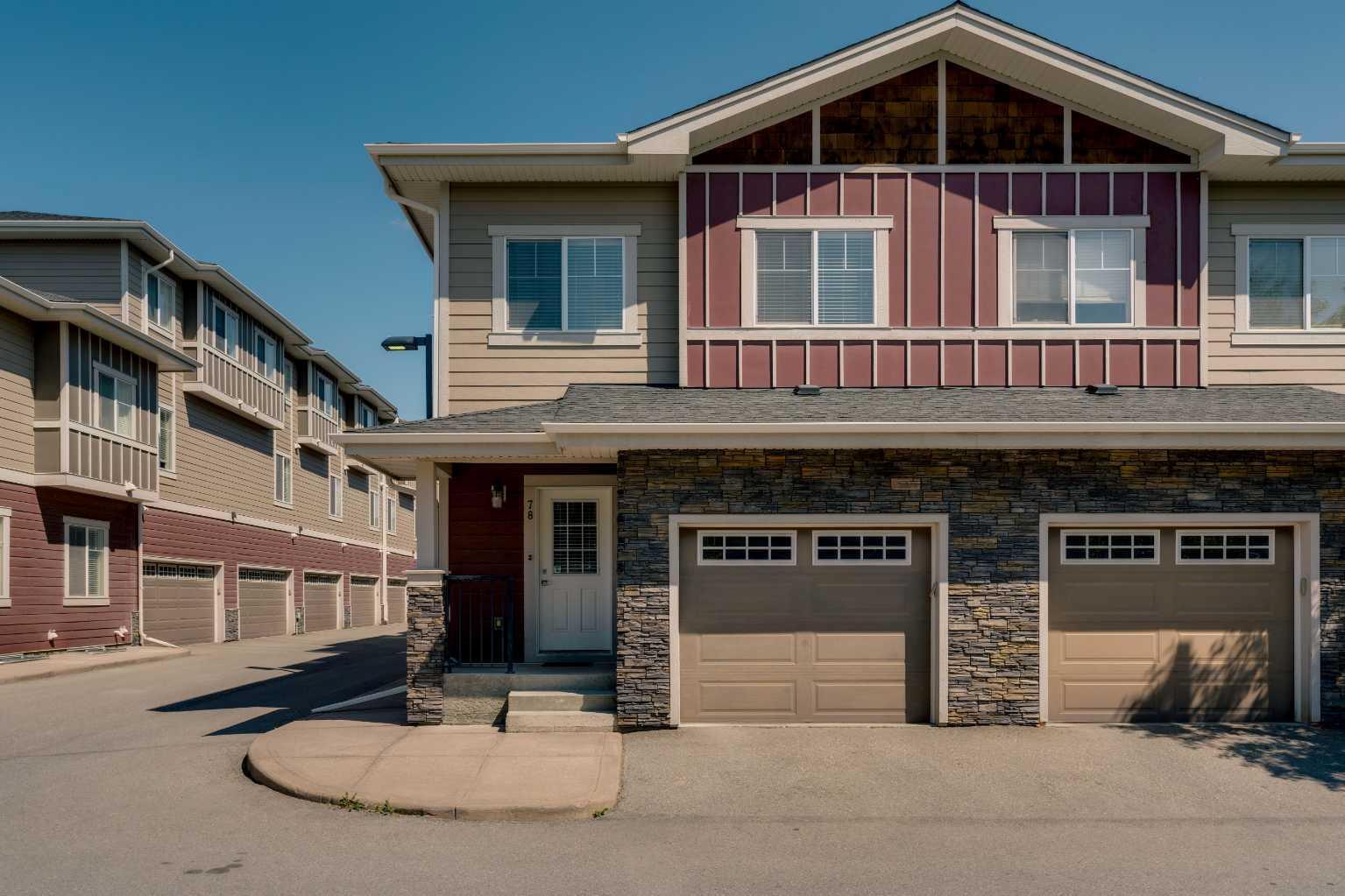 Property Photo: 78 West Coach Manor SW AB T3H 1R7
