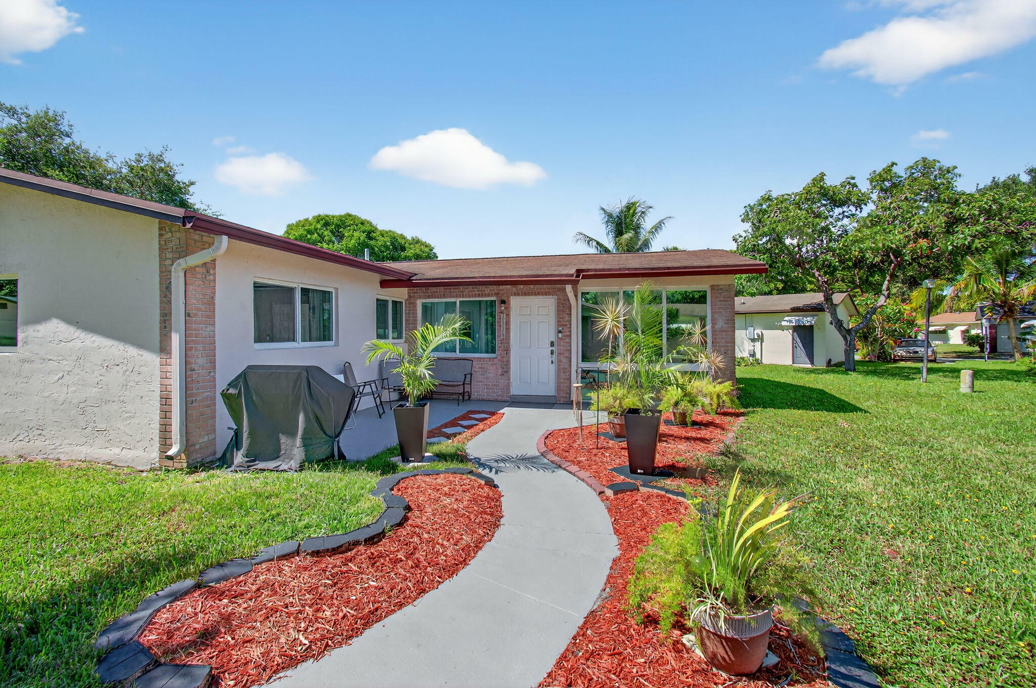 Property Photo:  2520 SW Natura Boulevard  FL 33441 