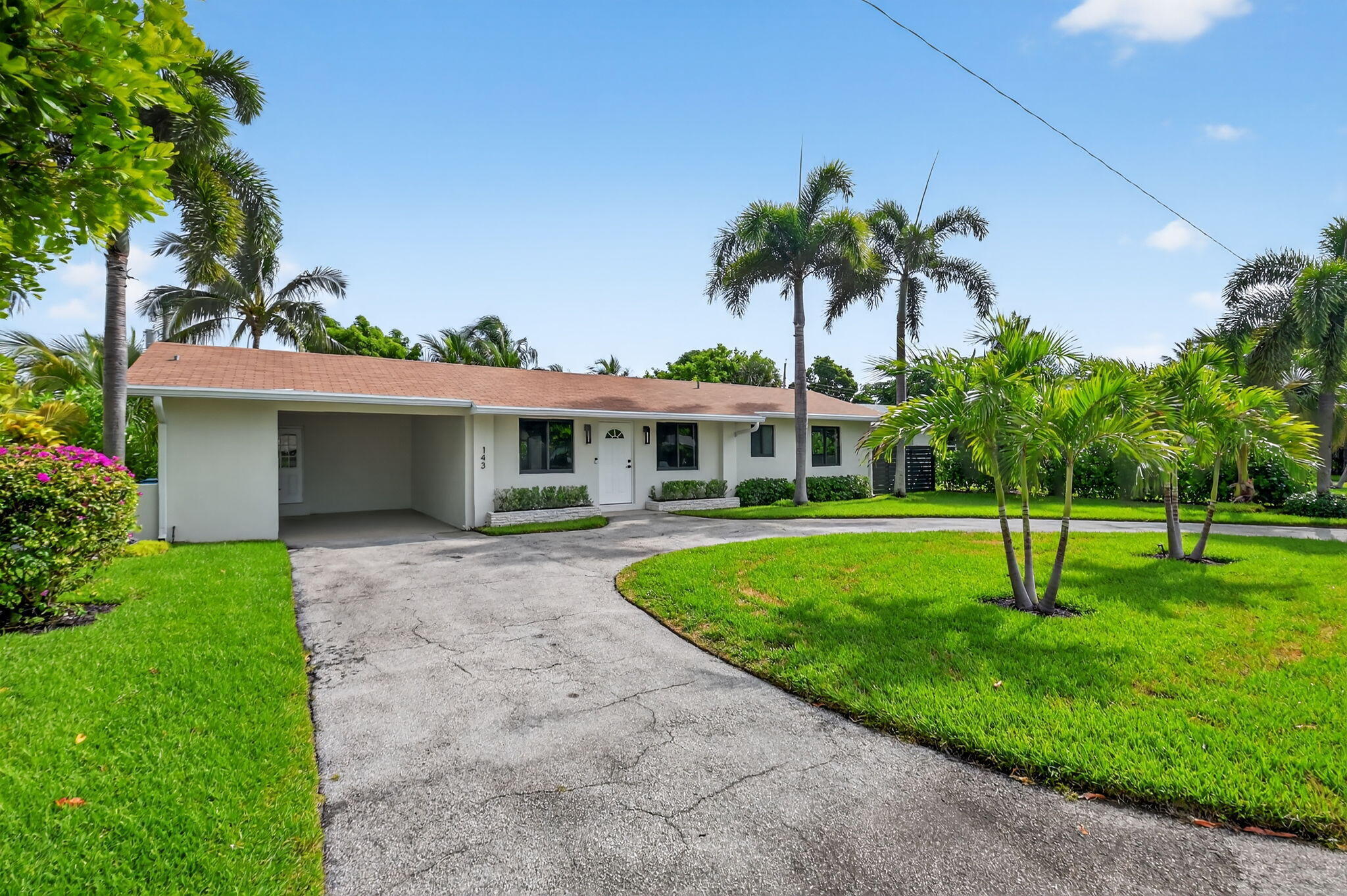 Property Photo:  143 SE 27th Way  FL 33435 