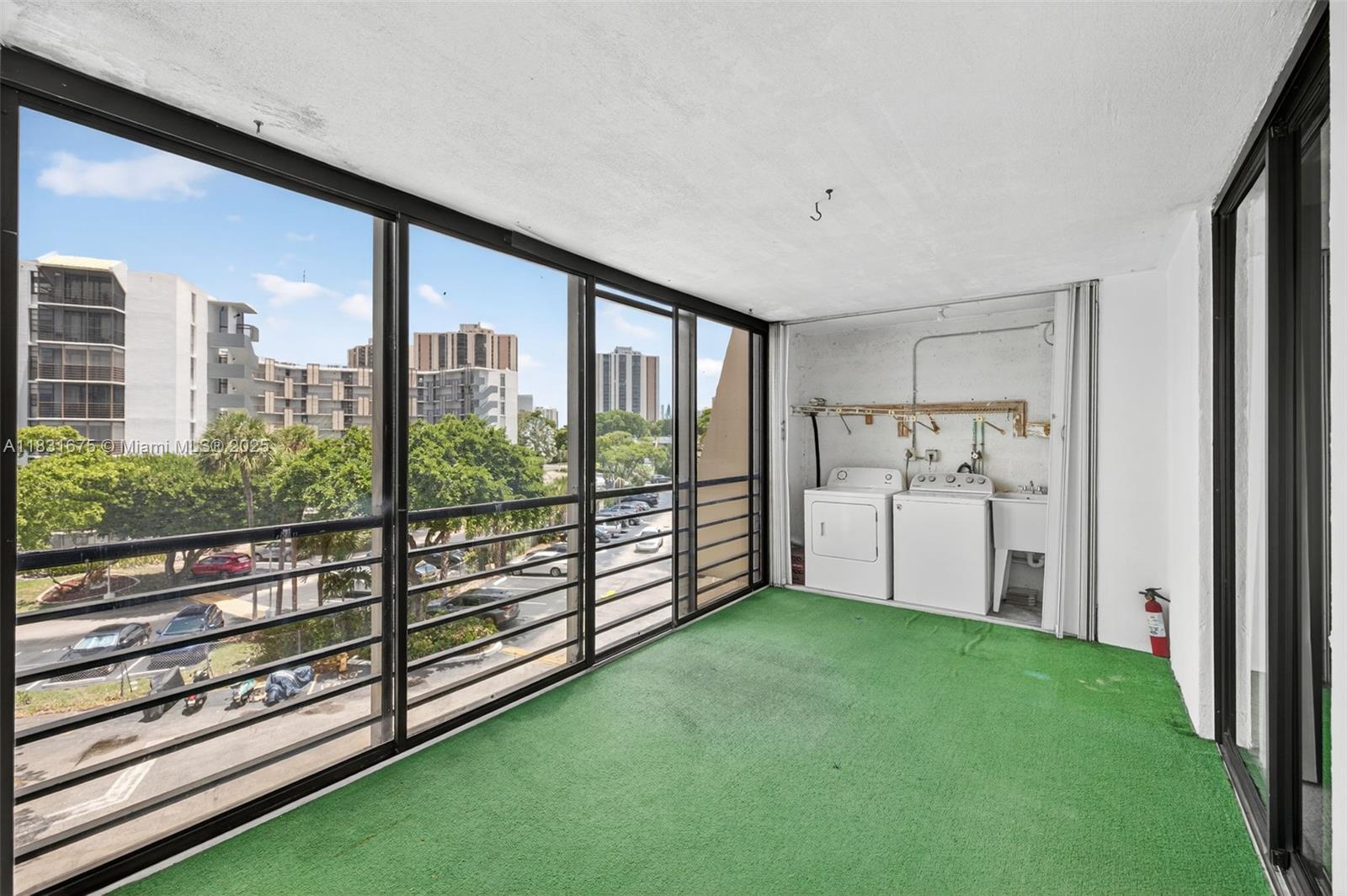 Property Photo: 20381 NE 30th Ave 410-7 FL 33180