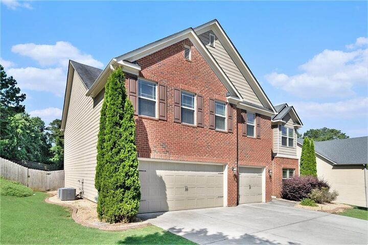 Property Photo: 5689 Woodland Greens Road GA 30135