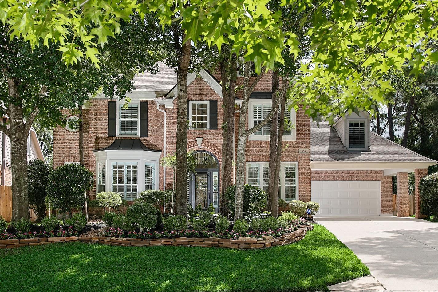Property Photo: 154 Slatestone TX 77382
