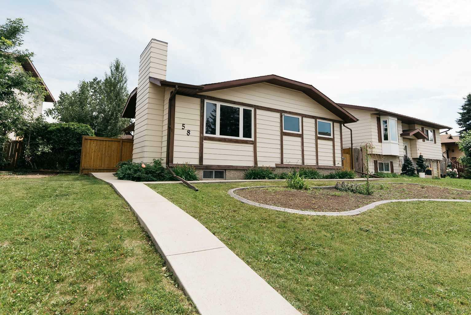 Property Photo: 58 Greenham Drive AB T4P 2X4
