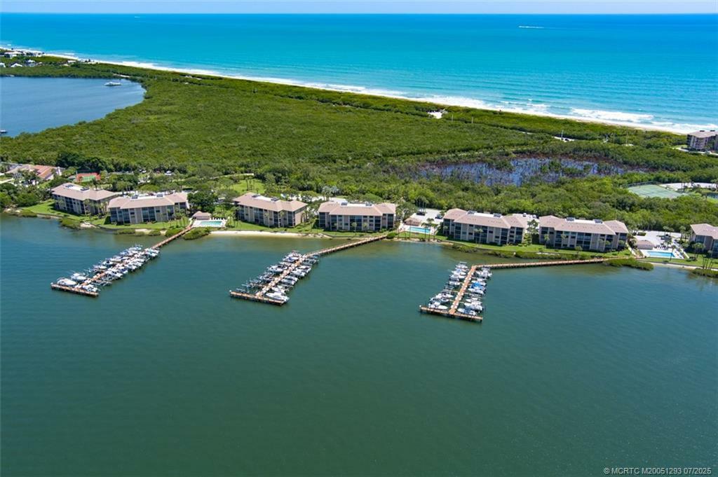 Property Photo: 4620 NE Sandpebble Trace 4-105 FL 34996