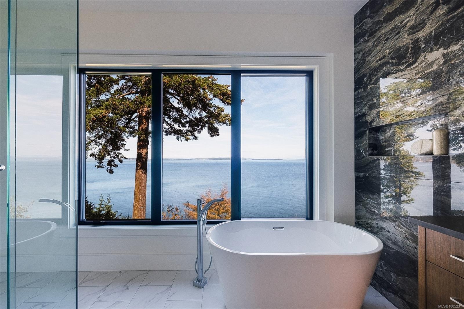 Property Photo: 4599 Cordova Bay Rd BC V8Y 2K1