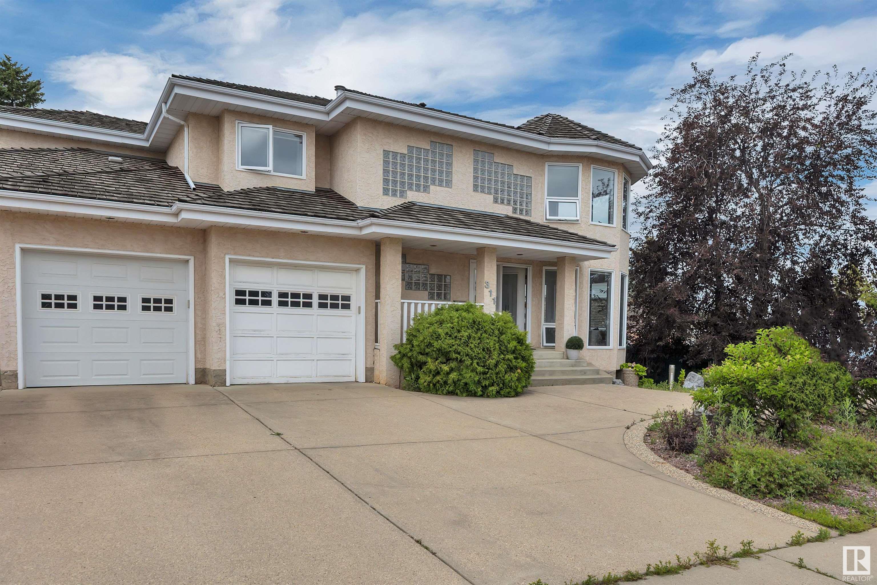 Property Photo:  311 Ferris Way NW  AB T6R 2C8 