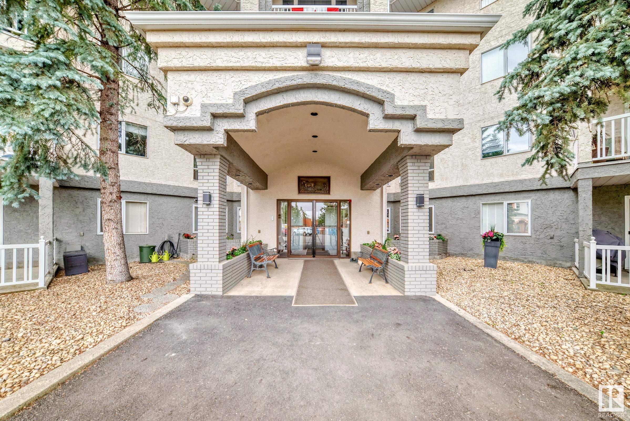 Property Photo:  10915 21 Avenue NW 211  AB T6J 6X2 