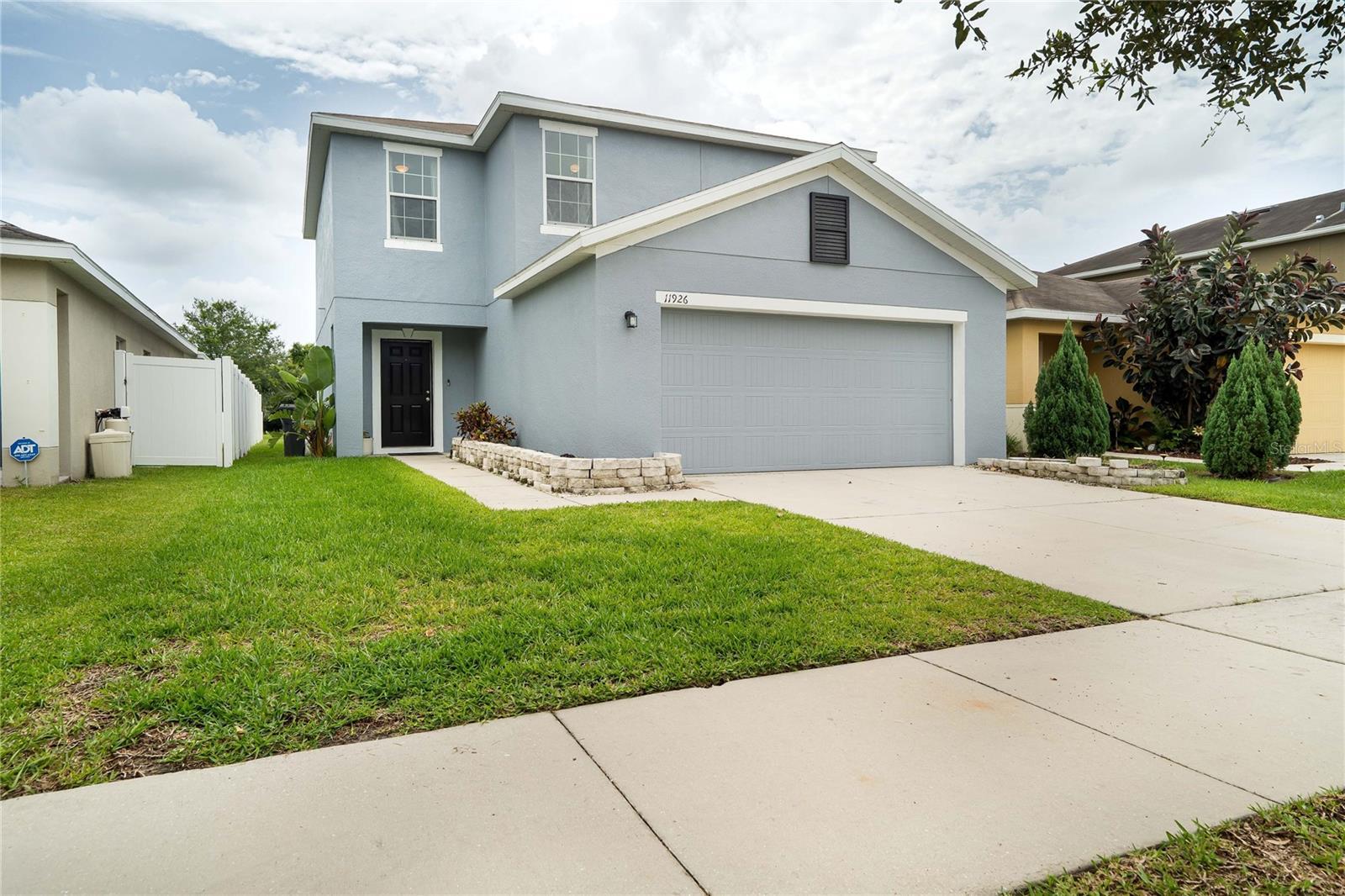 Property Photo: 11926 Grand Kempston Drive FL 33534