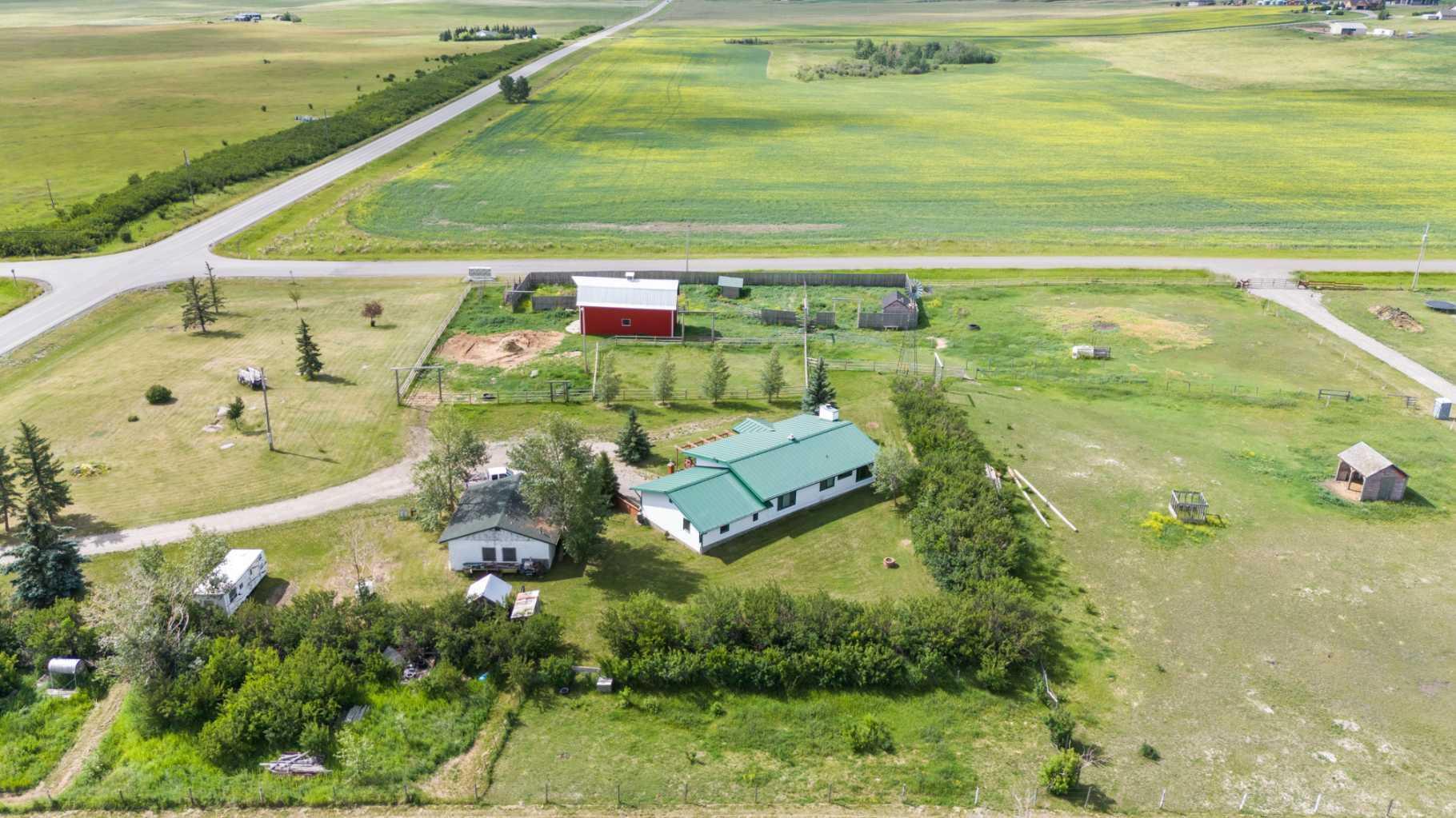 Property Photo: 386243 16 Street W AB T1S 6A7