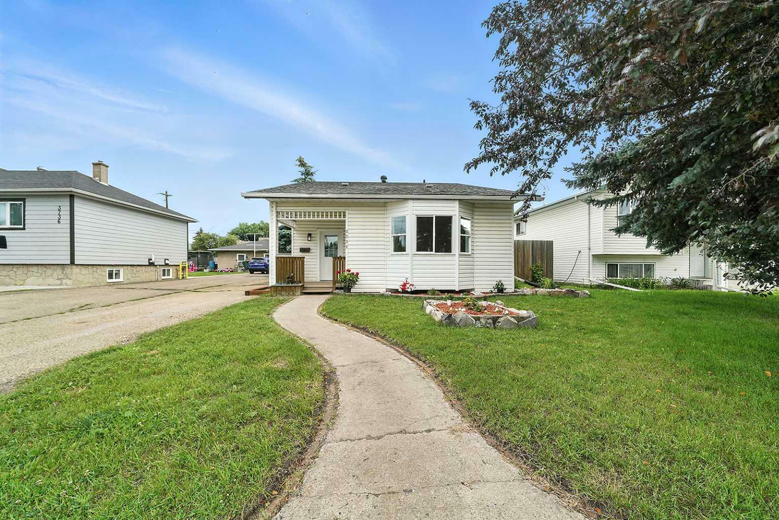 Property Photo: 3732 47 Street AB T4N 1N5