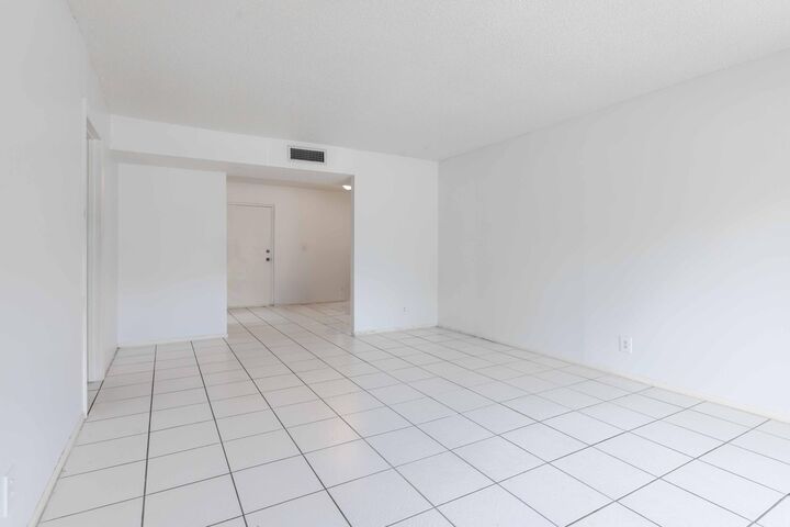 Property Photo:  490 NW 20th Street 1050  FL 33431 