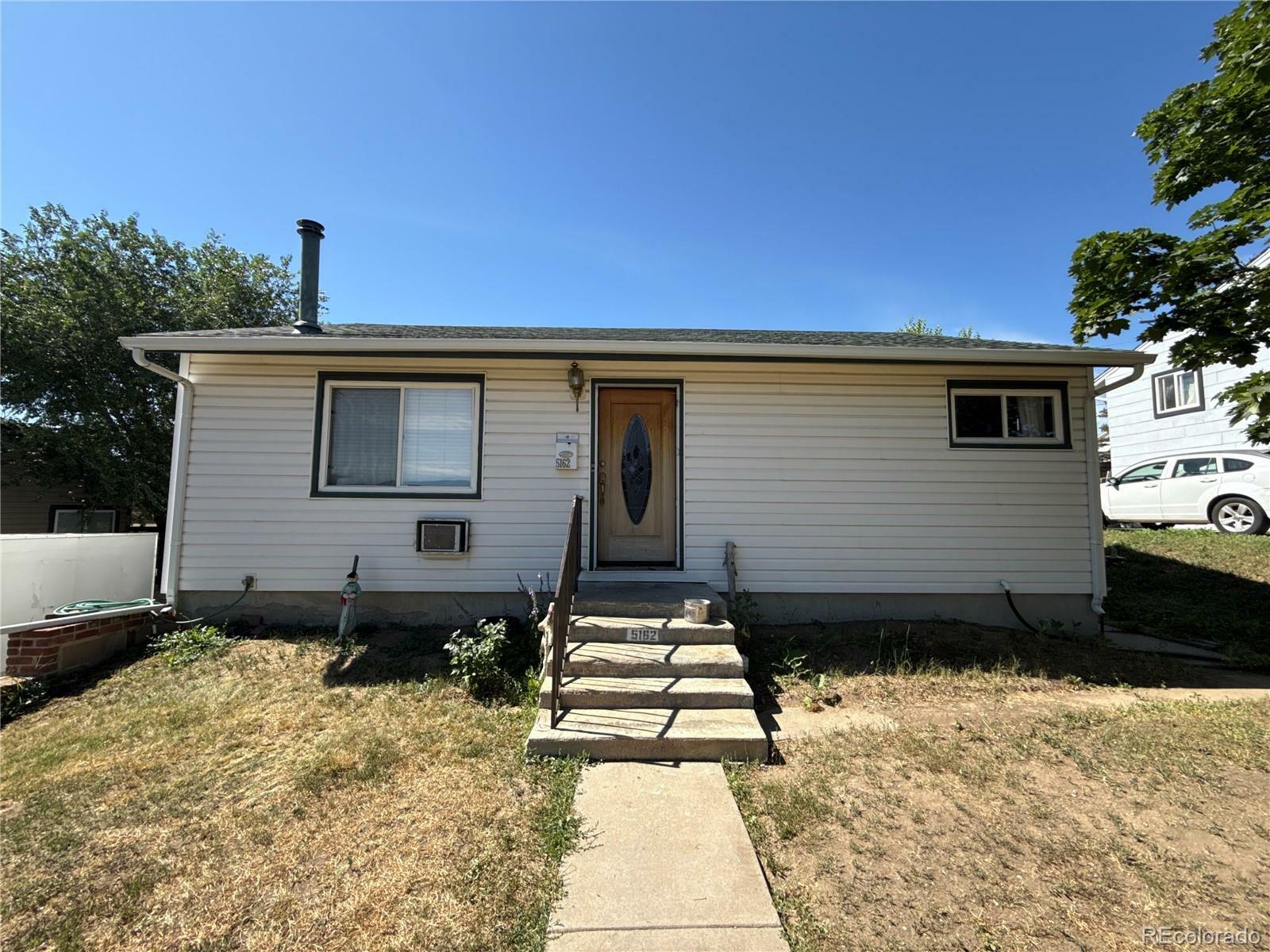 Property Photo: 5162 W Nevada Place CO 80219