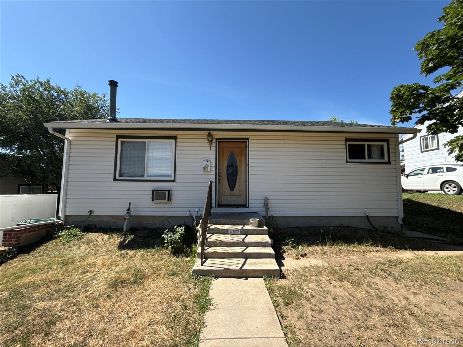 Property Photo: 5162 W Nevada Place CO 80219
