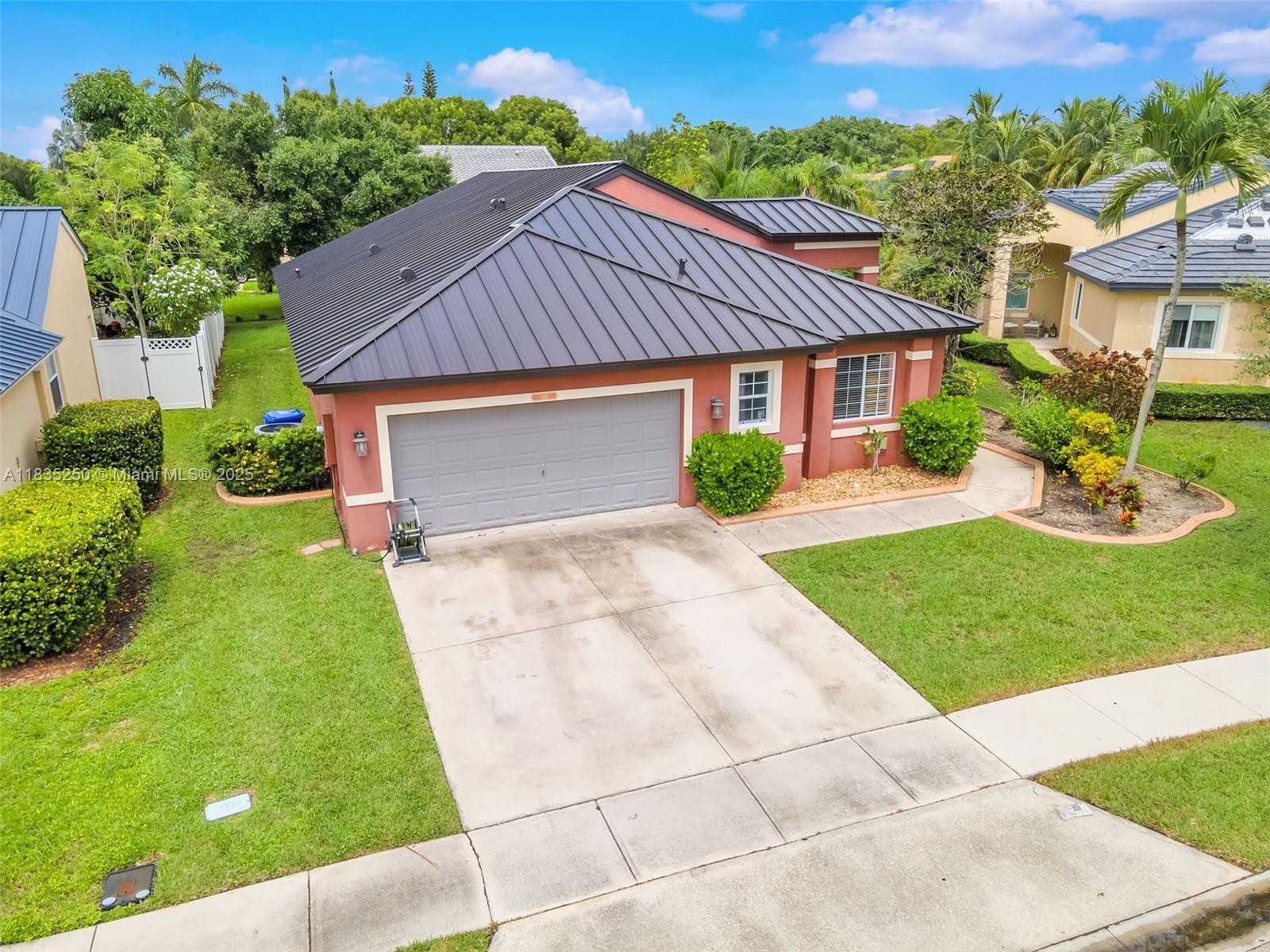 Property Photo: 326 SW 162nd Ave FL 33027