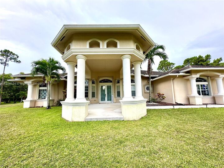 Property Photo:  13628 N 71st Pl N  FL 33412 