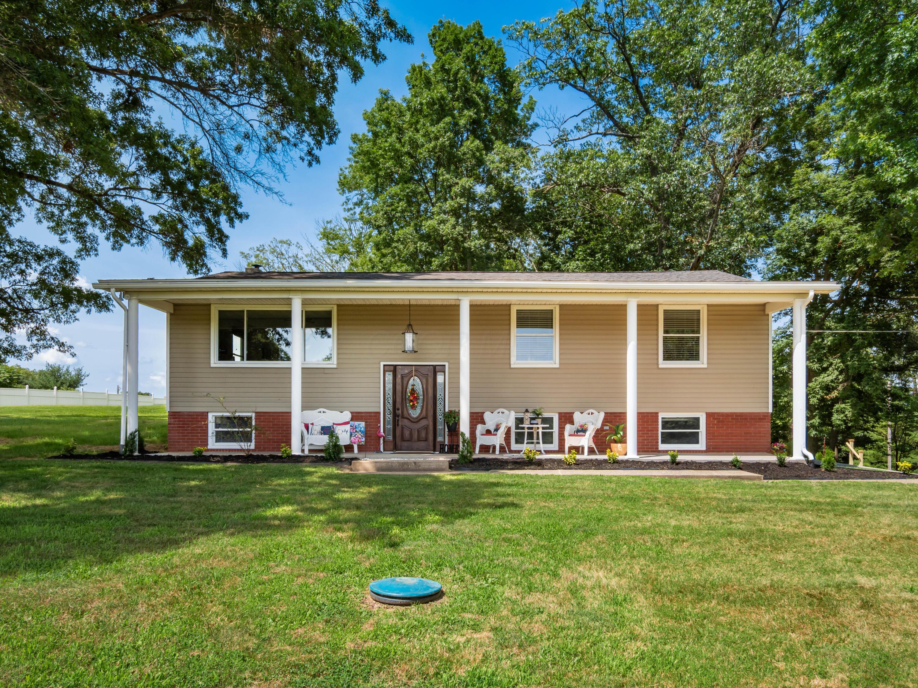 Property Photo: 5585 Helen Drive OH 43701
