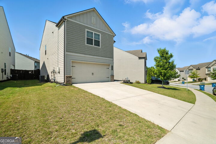 Property Photo:  153 Auburn Crossing Drive  GA 30011 