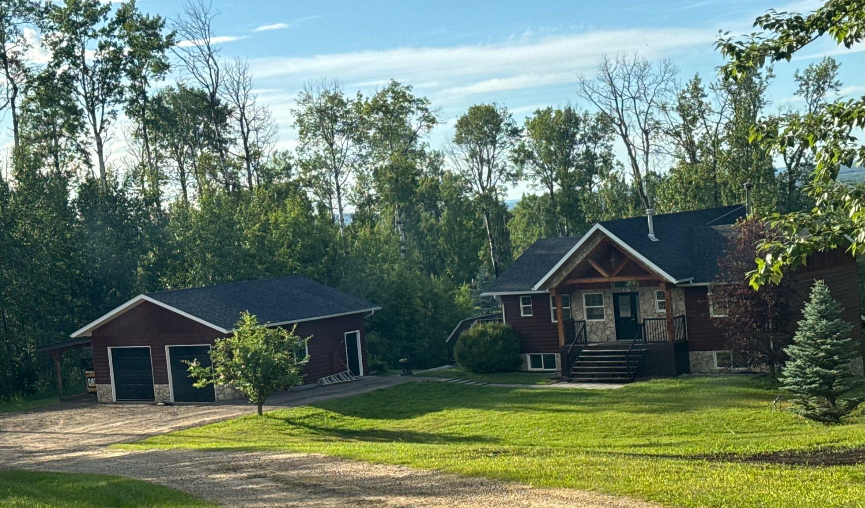 Property Photo: 592056 Range Road 121 16 AB T7S 1P2