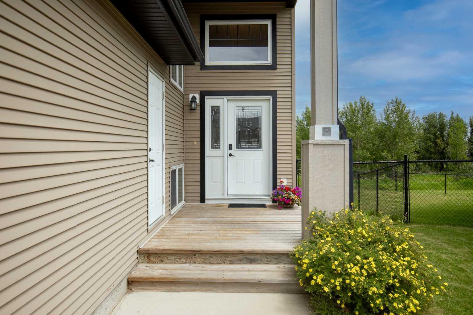 Property Photo: 4546 Iron Wolf Place 12 AB T4L 0G1