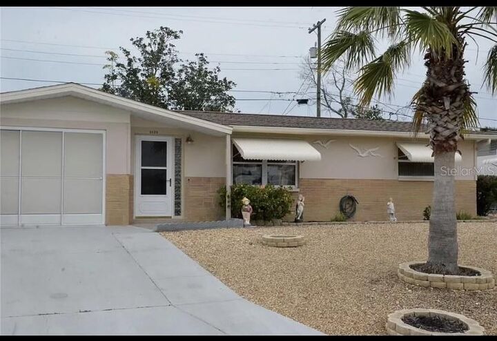 Property Photo:  5025 Zodiac Avenue  FL 34690 