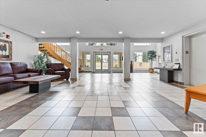 Property Photo: 7803 Golf Course Road 303 AB T7X 2Y6