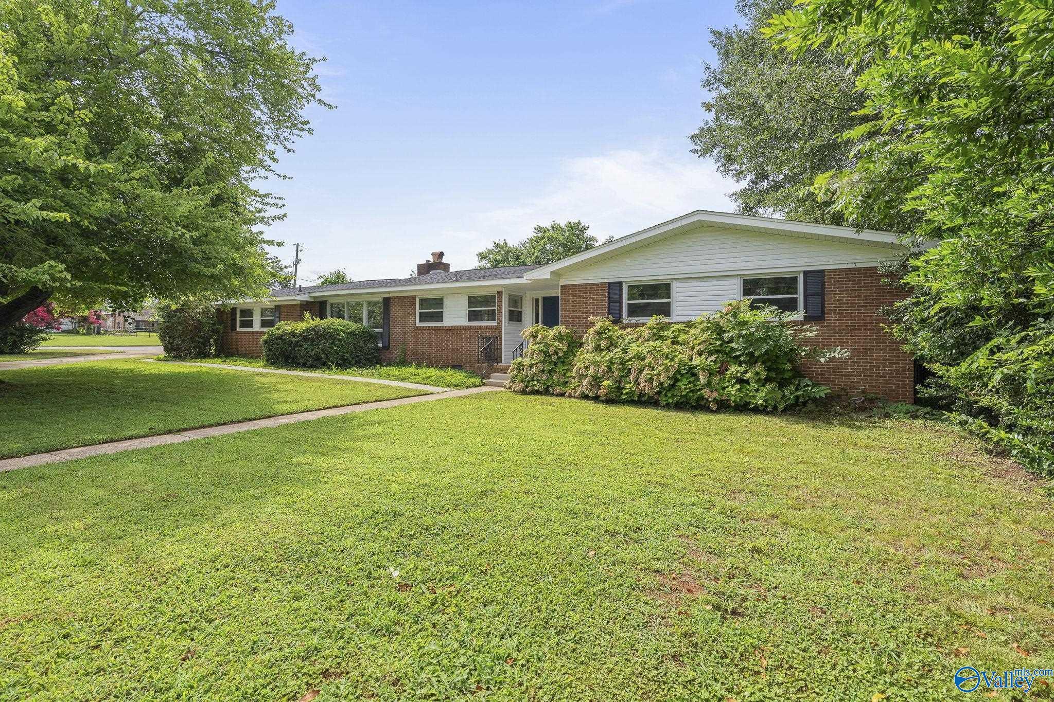 Property Photo: 7803 Logan Drive SW AL 35802