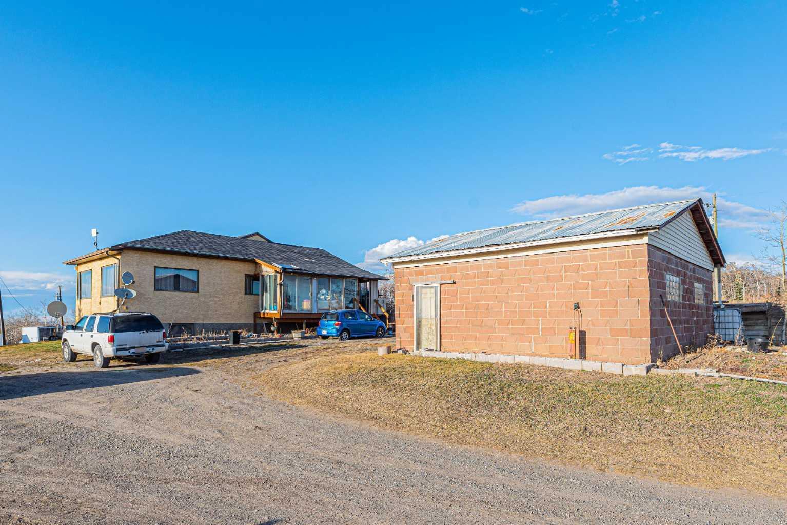 Property Photo: 266110 1014 Drive E AB T1S 4S5