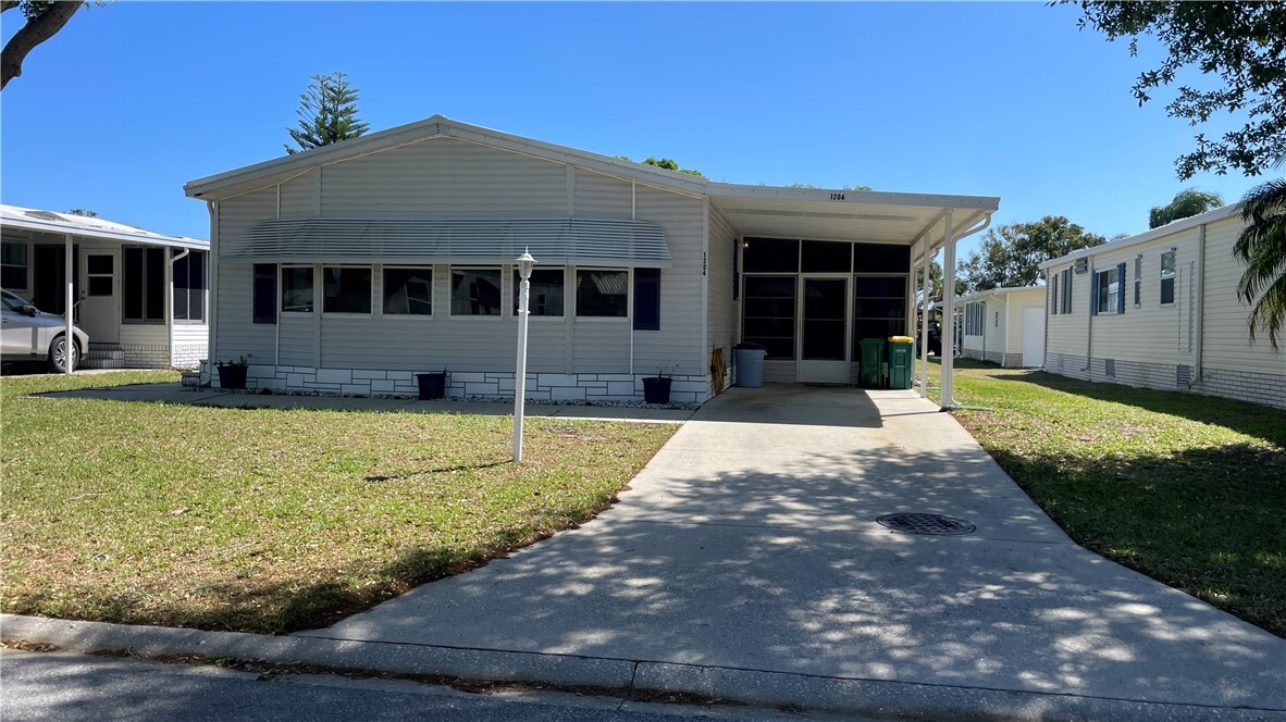 Property Photo: 1204 Calusa Drive FL 32976