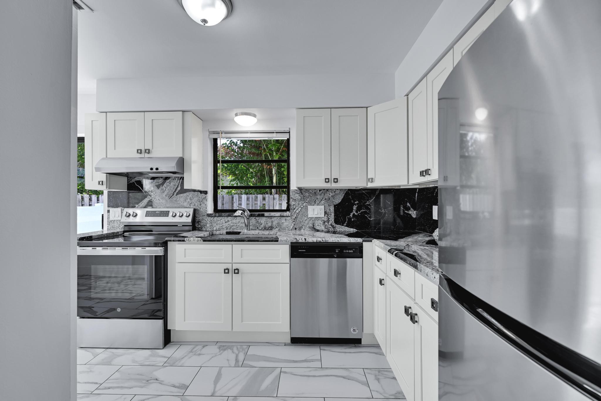 Property Photo: 498 NE 42nd Street FL 33431
