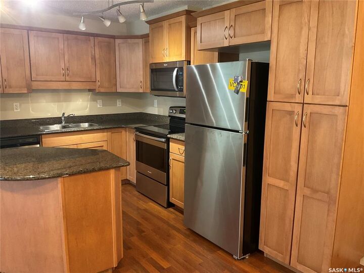 Property Photo: 103 Wellman Crescent B201 SK S7T 0C1
