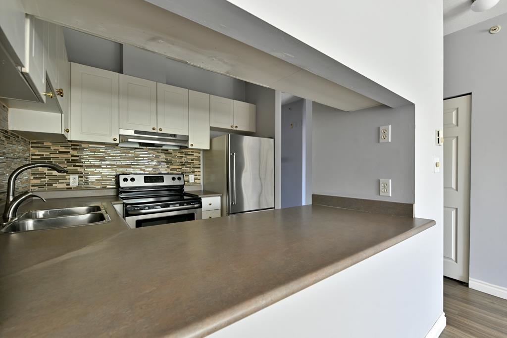 Property Photo: 19897 56 Avenue 201 BC V3A 3Y1